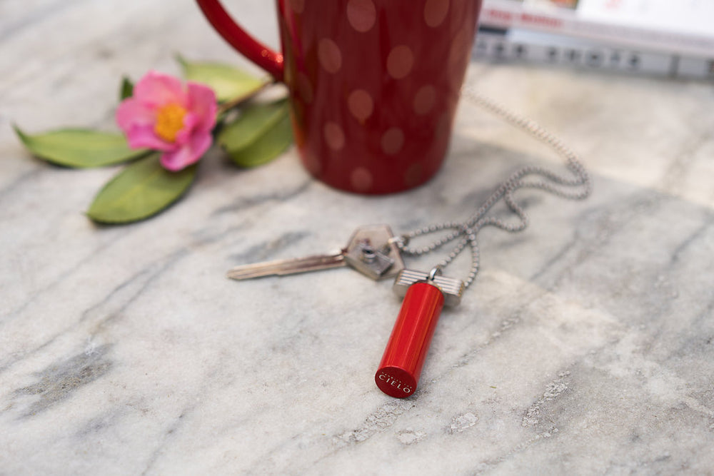 Designer Cielo pill fob worn as a necklace